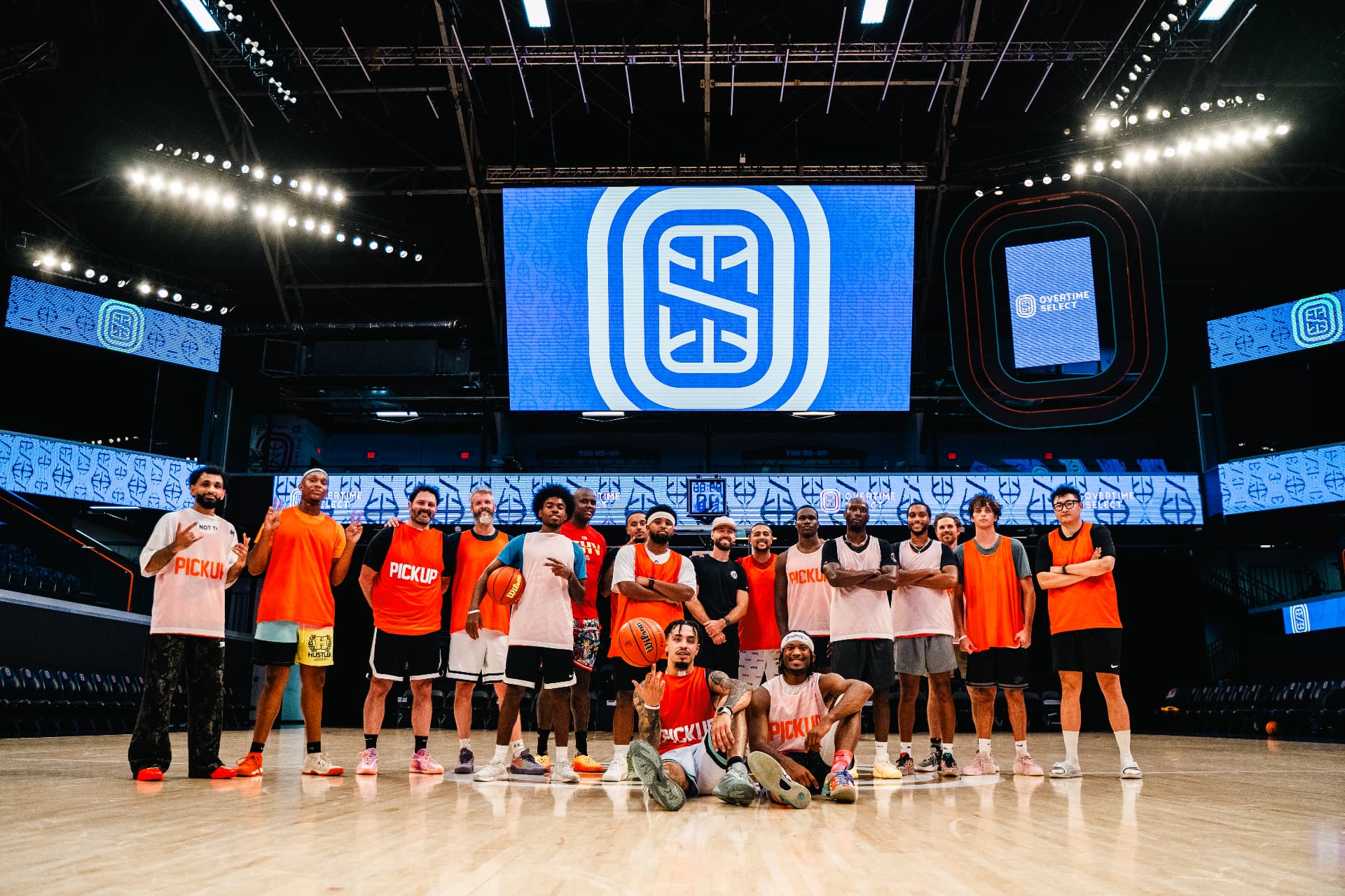 A Pickup crew posing together on an arena court