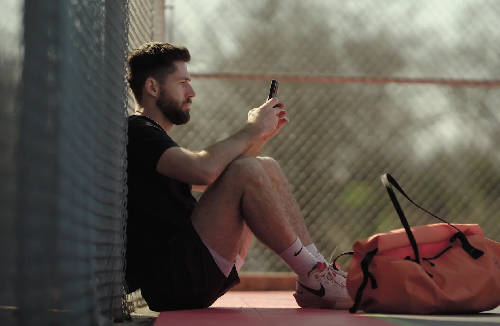 Hoopers courtside checking the Pickup app
