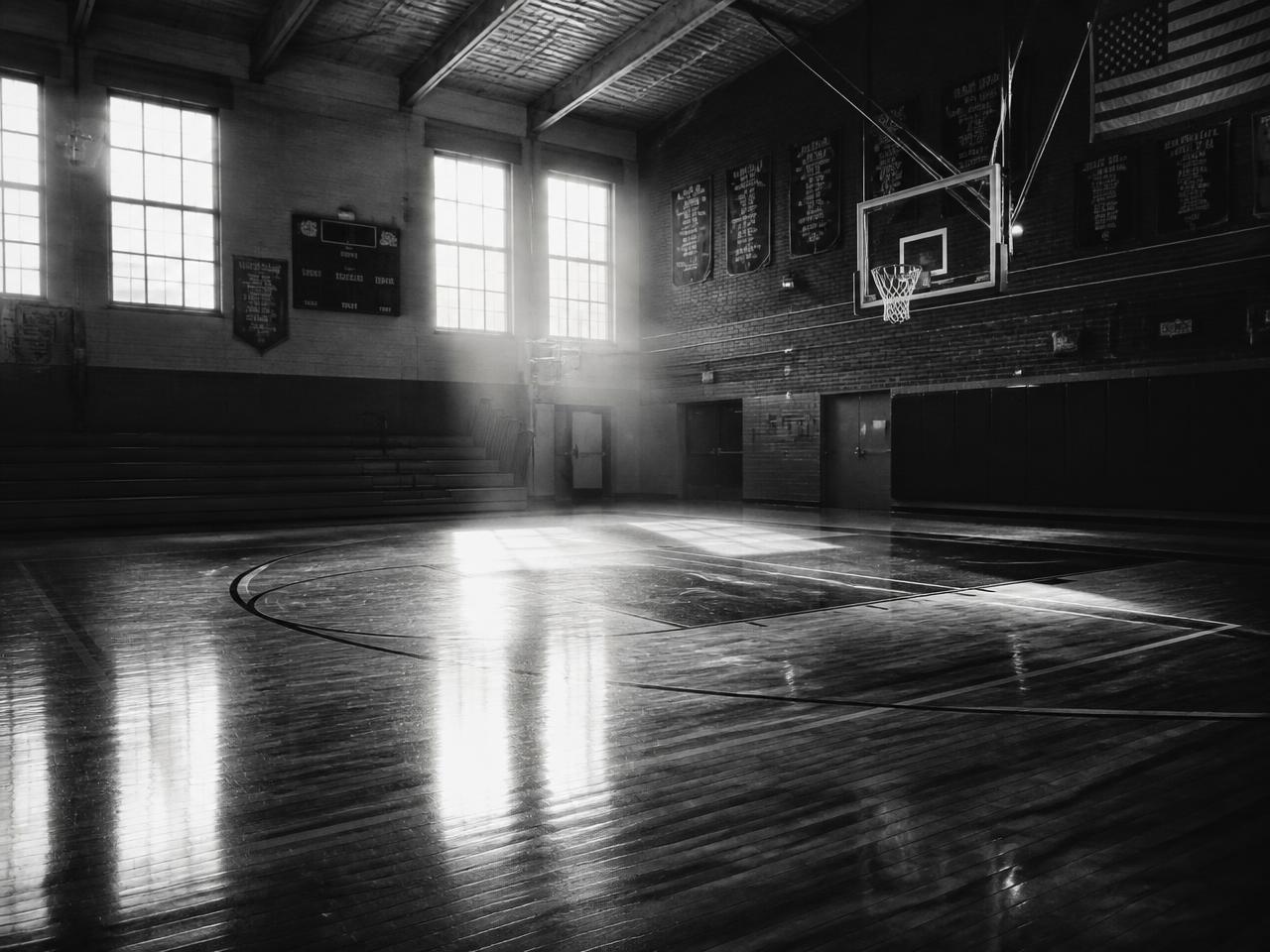 Empty gym court in morning light